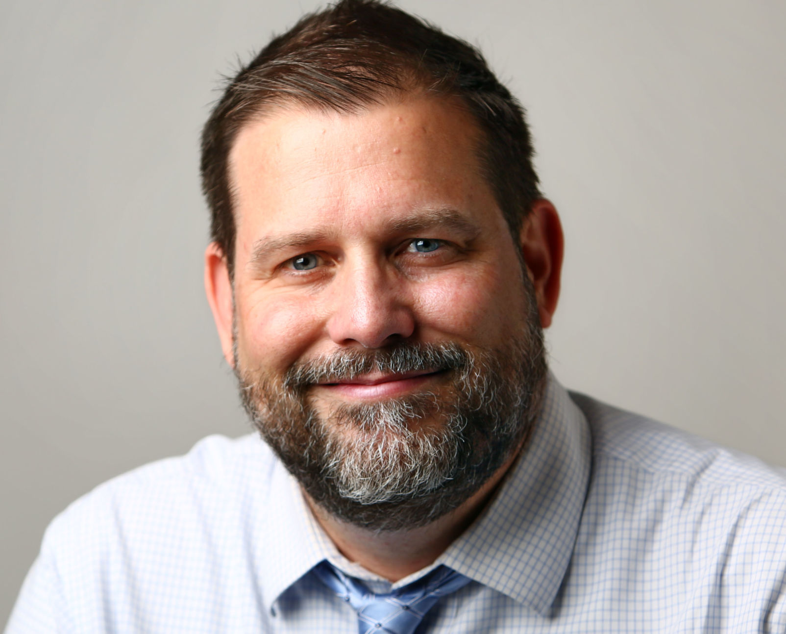 Mitch Pugh executive editor tighter